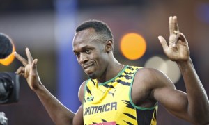 Usain is showing how many more gold medals he plans on winning at the World Championships.